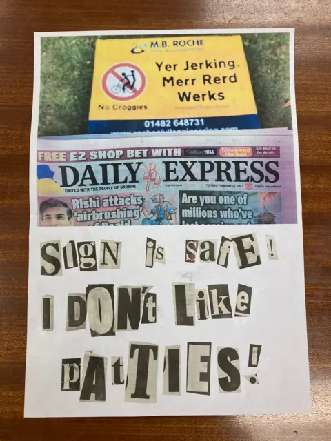 MB Roche A ransom note made up of cut-out black and white newspaper letters, a picture of a stolen road sign and a masthead from the Daily Express. The text reads: "Sign is safe! I don't like patties!"