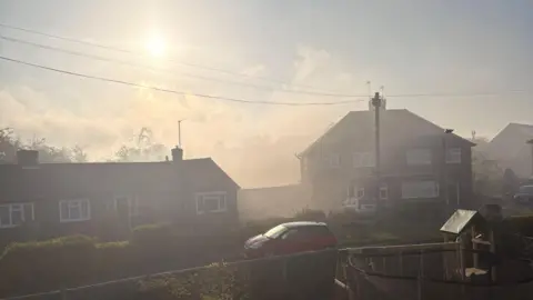 Naomi Lahiff Smoke has been pouring into the street.