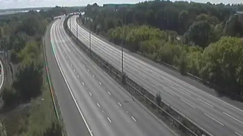 National Highways The M1 motorway on both sides empty.