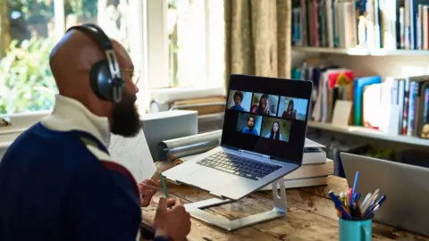 Getty Images A man working from home 