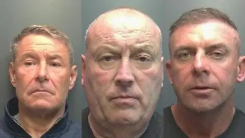Compiled custody photos of three men looking directly at the camera.
The man on the left has brown hair and a side hair parting to the left and is wearing a grey quarter zip.
The man in the middle is wearing a grey shirt but the image is mainly a close up of his face.
The final man on the right has brown hair combed to the left.
He is also wearing a grey shirt.