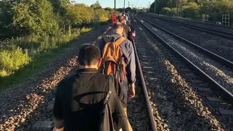 Ryan Scrivener Passengers from another train walked to Wixam after the collision further along the line