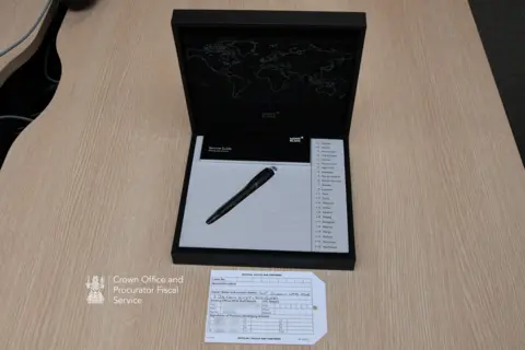 COPFS Crown Office photograph of a fountain pen in a box.