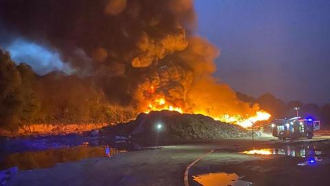 Pile of textiles on fire at a wasteplant in Braintree, Essex