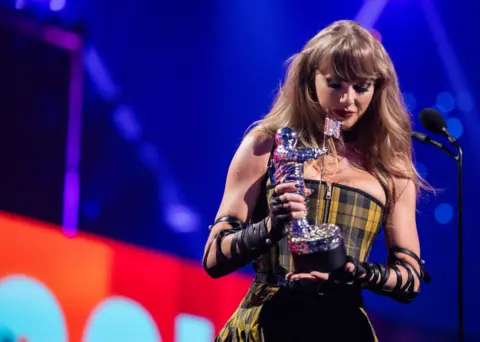 Getty Images Taylor Swift accepts an grant  astatine  the 2024 MTV VMAs