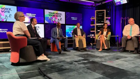 BBC From left: Caroline Russell, James Murray, Eddie Nestor, David Simmonds, Munira Wilson and Alex Wilson