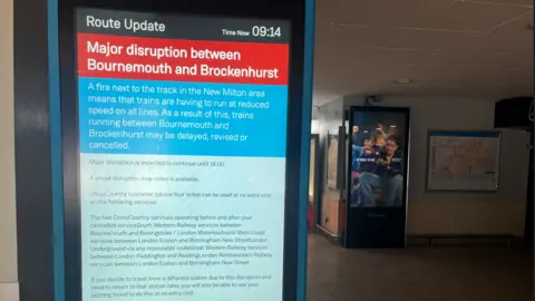 A free-standing illuminated display board in Southampton Central station warns of major disruption between Bournemouth and Brockenhurst.