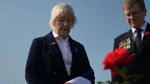 Major Angier's daughter Tabby by her father's grave