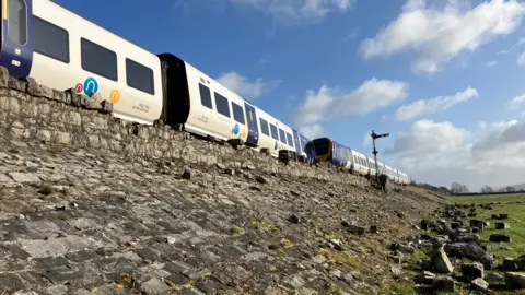 BBC/Jennie Dennett Derailed train