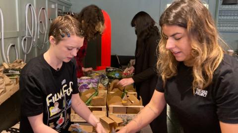 Vegetable boxes are packed for disadvantaged young people in Bristol