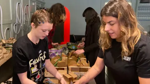 BBC Vegetable boxes are packed for disadvantaged young people in Bristol