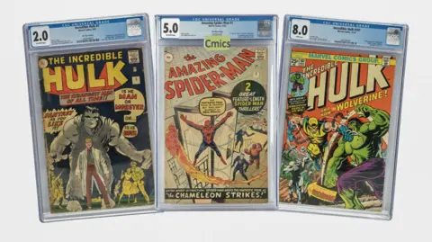 Three comic books placed side by side.