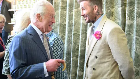A picture of David Beckham and King Charles 