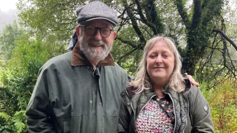 Bob Rogers and Abersychan councillor Lynda Clarkson standing together, smiling towards the camera. 