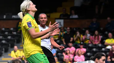 Richard S Brown Natasha Snelling, a Norwich City women's footballer playing in a match.