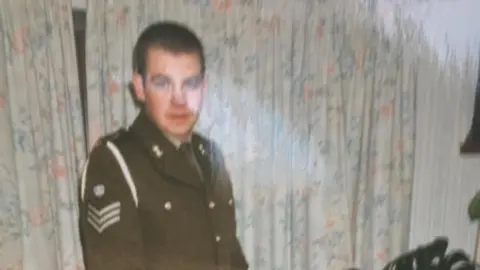 An old photo of Griffiths in an Army blazer.
