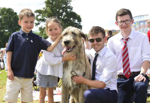 ill and sister Georgia Gardiner pictured with dog Carson, Calum Guiney and Andrew Devlin