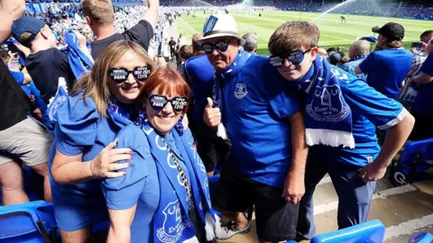 PA Media Everton fans during the Premier League match at Goodison Park
