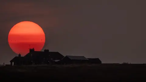 John Bradburn/ BBC Weather Watchers Red sunset in Buxton, Derbyshire