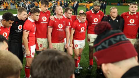 Wales team dejected after losing the second Test against Australia in Melbourne