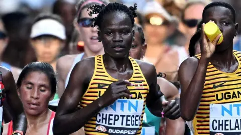 Alamy Uganda's Rebecca Cheptegei in action during the women's marathon final