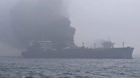 Lee Whitaker/Getty Images The tanker Stena Immaculate, with smoke billowing out of it.