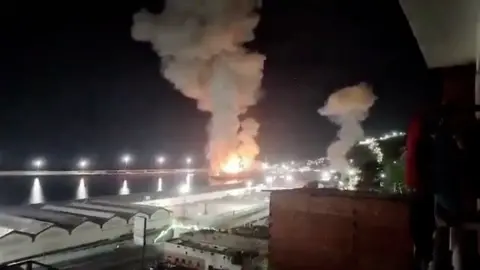 Columns of smoke in La Guaira port