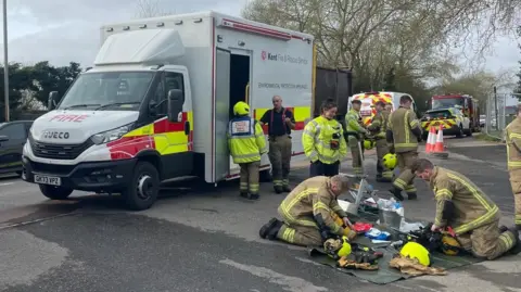 Fire crews outside a garage in Mill Road, Canterbury