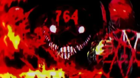 A satan image surrounded by flames with 764 on the figure's head