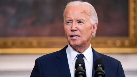 Getty Images President Joe Biden announces prisoner swap with Russia in the State Dining Room of the White House