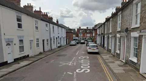 A street of terraced houses. 