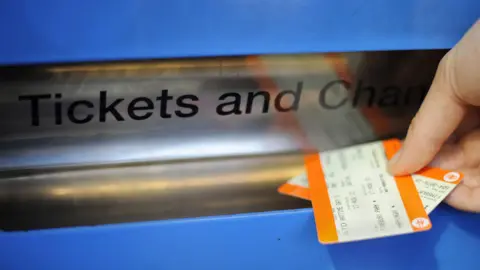PA Media Paper tickets being collected from machine