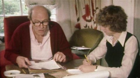 Roald Dahl and his assistant answering letters