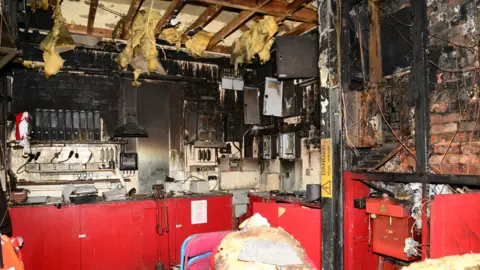 Redcar and Cleveland Borough Council Burned wires and insulation inside the building