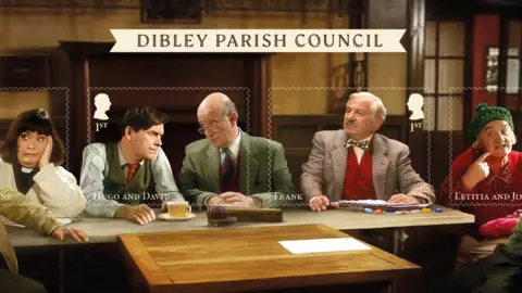 Royal Mail Another iconic Vicar of Dibley scene - the Dibley Parish Council. Starring left to right - Dawn French a Geraldine Granger, James Fleet as Hugo; Gary Waldhorn father David.