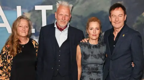 Getty Images Raynor Winn, Moth Winn, Gillian Anderson and Jason Isaacs attend the UK Special Screening of "The Salt Path" at The Curzon Soho on May 22, 2025 in London, England. 