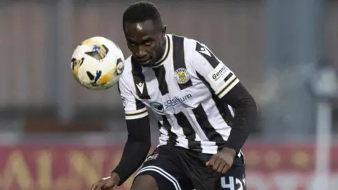 Elvis Bwomono in action for St Mirren during a William Hill Premiership match between St Mirren and Dundee United at the SMiSA Stadium, on January 11, 2025, in Paisley,