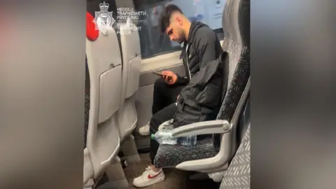 Cardiff: Appeal after man allegedly masturbates on train