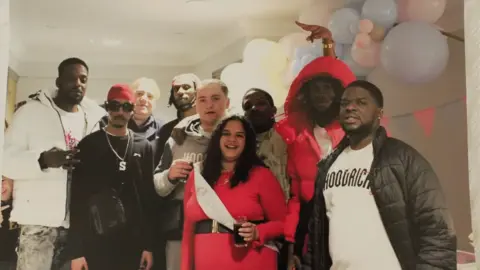 Family Shawn, second from left, at a halloween party in Birmingham. He is surrounded by friends enjoying themselves