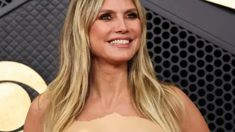 Reuters Heidi Klum in a nude latex dress