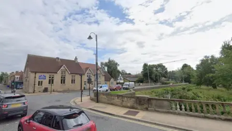 a road with cars