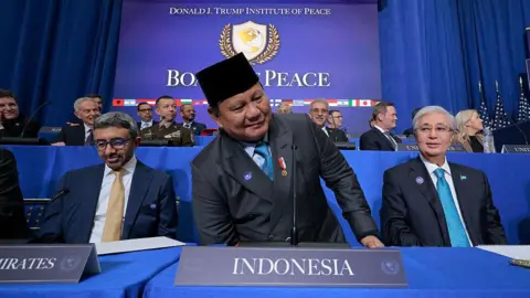 President of Indonesia Prabowo Subianto taking his seat as he attends the inaugural meeting of the Board of Peace at the Donald J. Trump Institute of Peace in Washington DC.