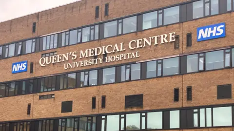 Signage on the exterior of QMC in Nottingham