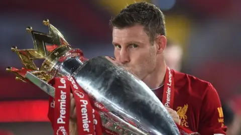 James Milner with Premier League trophy