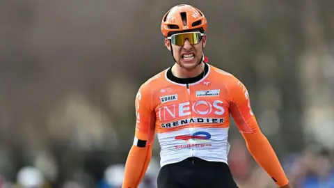 Axel Lawrence celebrates winning stage three of the Tour de la Provence