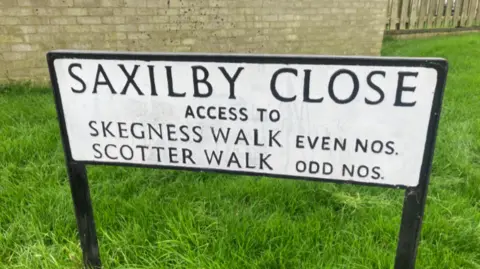 Jenny Kirk/BBC A sign for Saxilby Close which leads to Skegness Walk, Corby