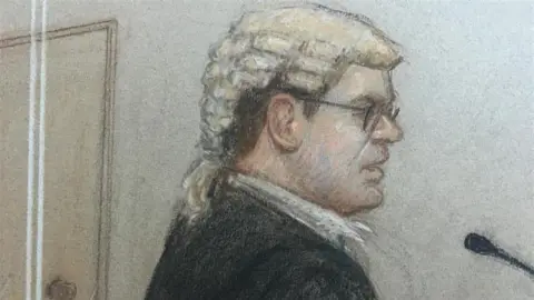 Julia Quenzler A sketch of prosecuting KC Tom Little in court, wearing glasses and speaking into a microphone.