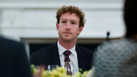 Meta CEO, Mark Zuckerberg, in a suit and tie looks on during a dinner hosted by US President Donald Trump with US tech leaders at the White House, in Washington, DC, USA, 04 September 2025.
