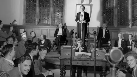 Oxford Union Debate : 1948 : picture shows - A debate with members of the United States Military Academy, West Point. Sir Edward Boyle calling for division at the end of the debate.
