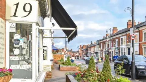 A road in The Jewellery Quarter, Birmingham, with jewellers lining the sides of the road.
